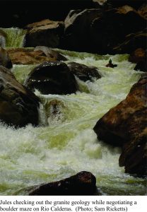 Negotiating granite-boulder strewn rapids on Rio Calderas