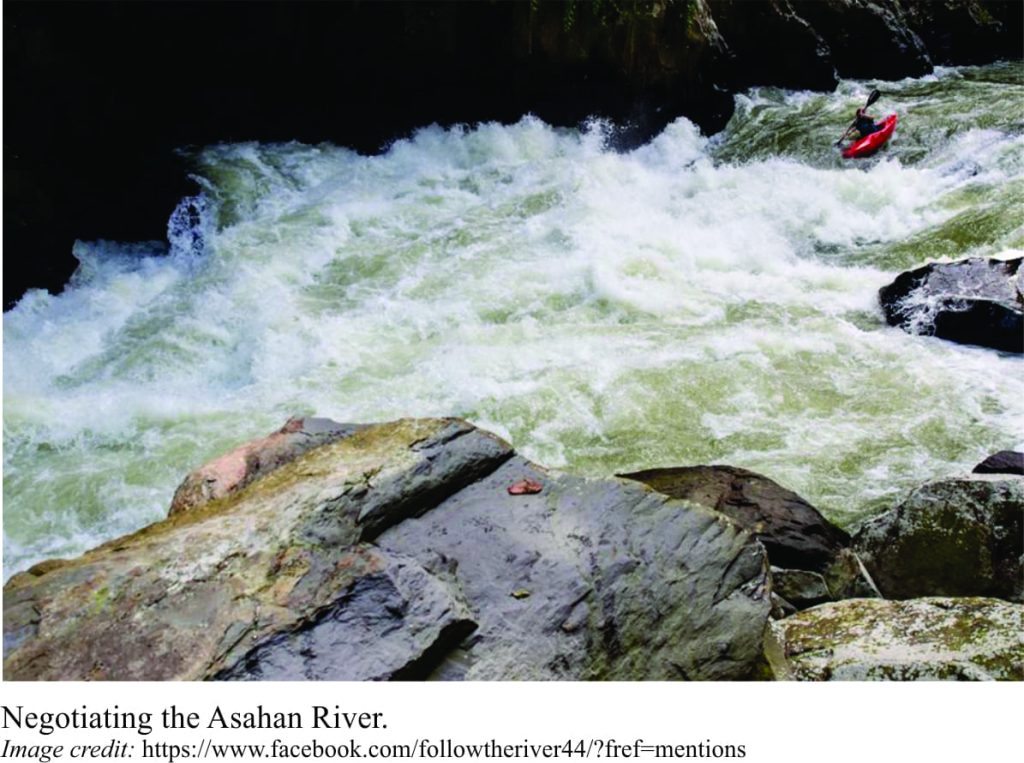 Asahan rapids and a lone kayaker