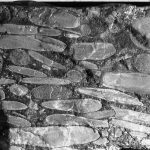 Detail of channel conglomerate consisting almost entirely of reworked calcite concretions. Elongate clasts are concretions that formed in laminated and rippled Tc intervals; the ovoid and spherical concretions are coarser grained and formed in Ta or Tb Bouma intervals. Omarolluk Fm. Proterozoic, Belcher Islands.