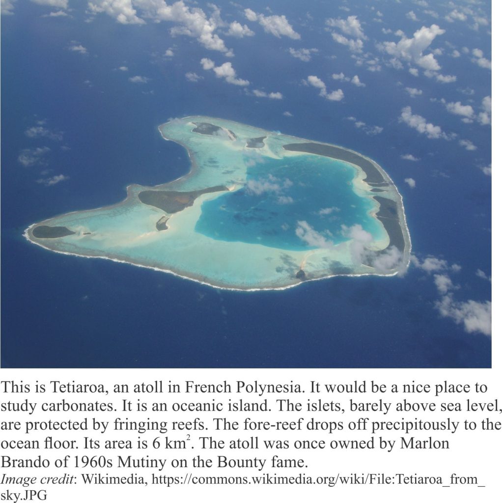 Tetiaroa coral atoll, French Polynesia, atop an extinct submarine volcanoe, or seamount. The fore reef drops precipitously to the deep ocean floor.