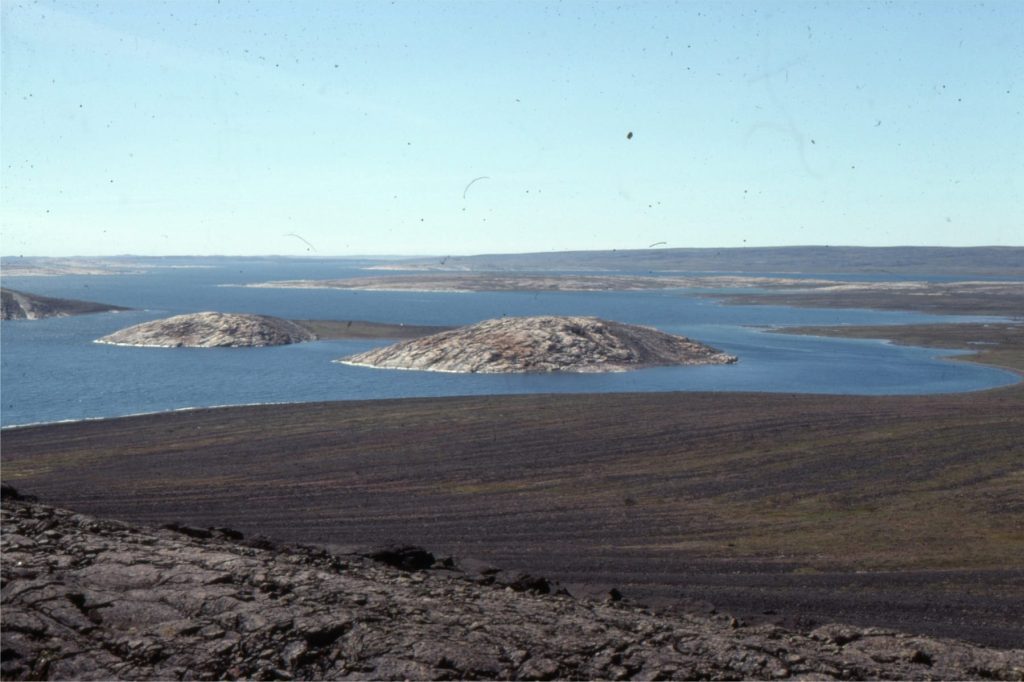There are 100s of gravel ridges on this island slope. Each ridge formed as a beach geometry of the berms approximately parallels the modern shoreline. Isostatic uplift, or rebound of the island landmass during deglaciation of the Laurentide Ice Sheet has left the ridges stranded well above modern sea level. 